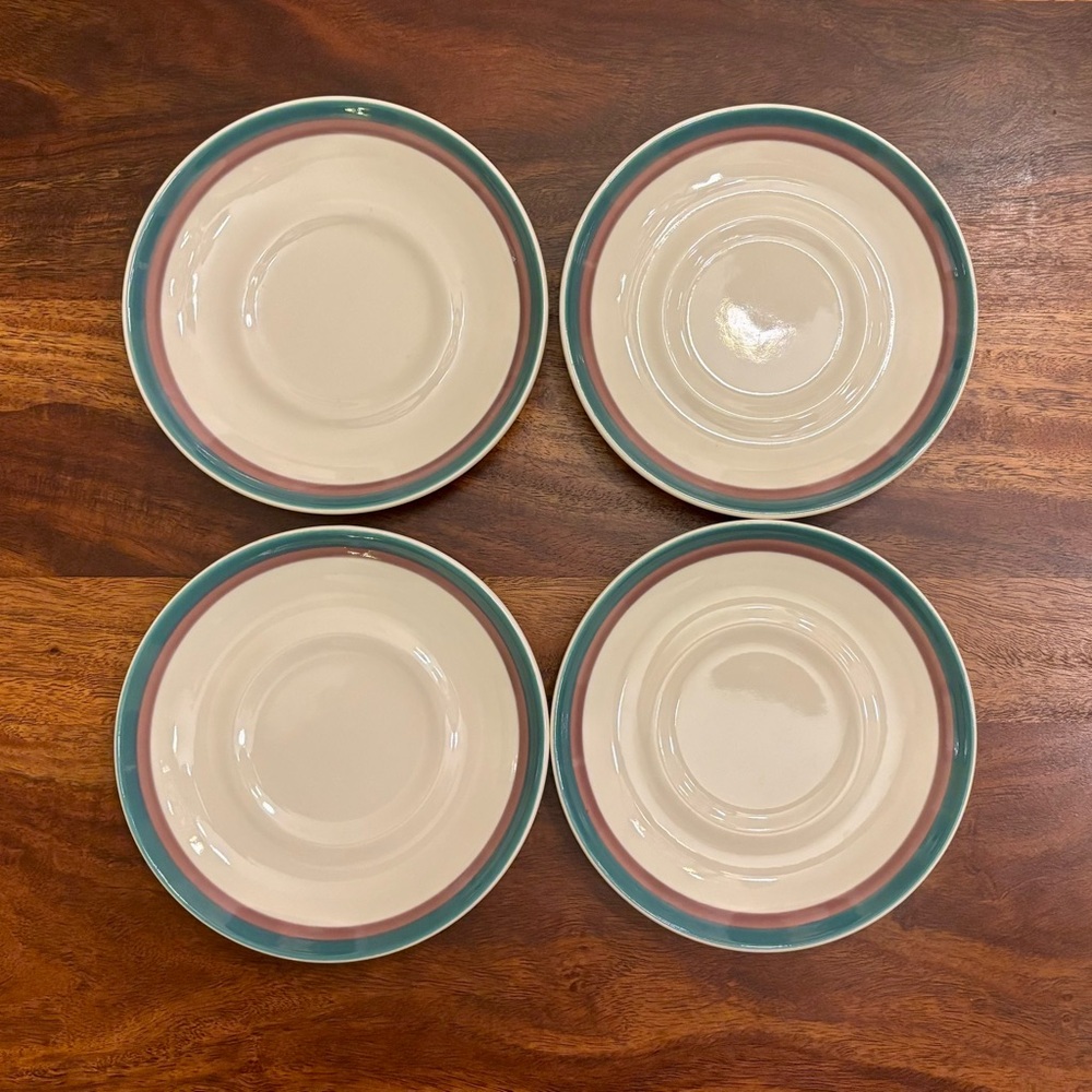 Four vintage Pfaltzgraff Juniper saucers